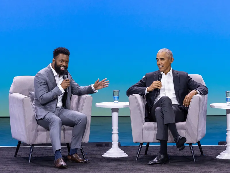 Baratunde Thurston in conversation with President Barack Obama at the Obama Foundation Democracy Forum
